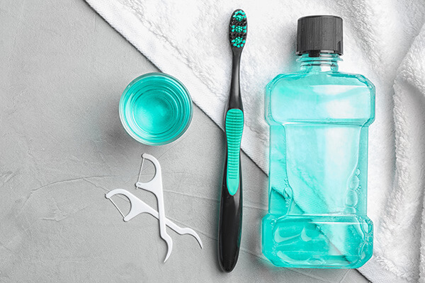 Mouth wash and toothbrush