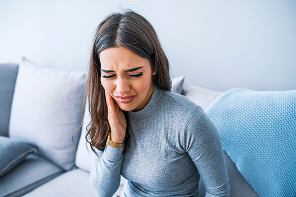 lady with infected tooth